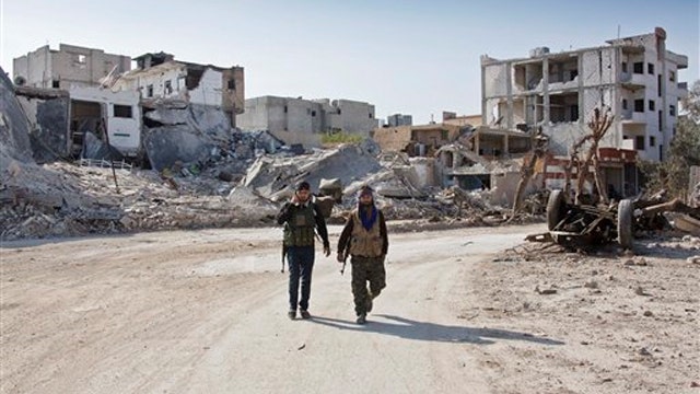 Kurdish fighters advance after driving ISIS from Kobani