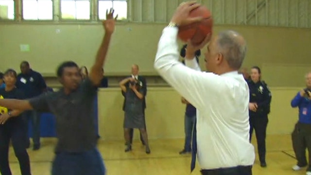 Eric Holder hoops it up in San Francisco