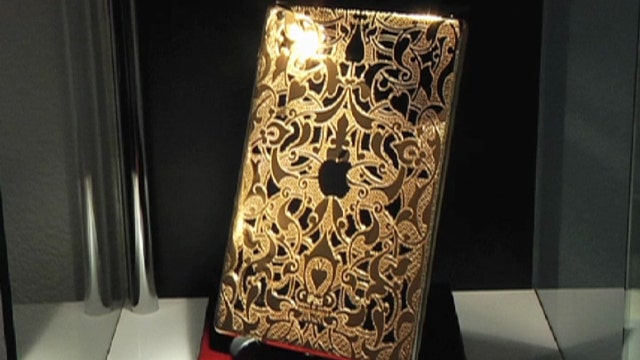 Filthy rich tech: $8,000 gold phones 