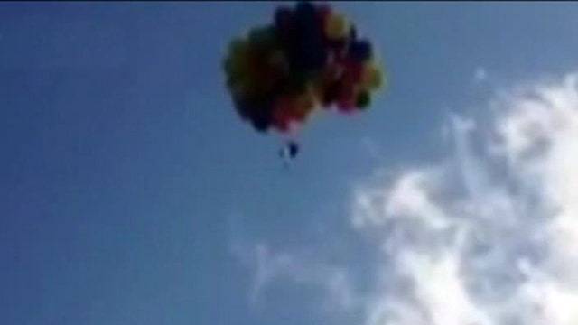 Man flies over Calgary in chair tied to 110 helium balloons | Fox News ...