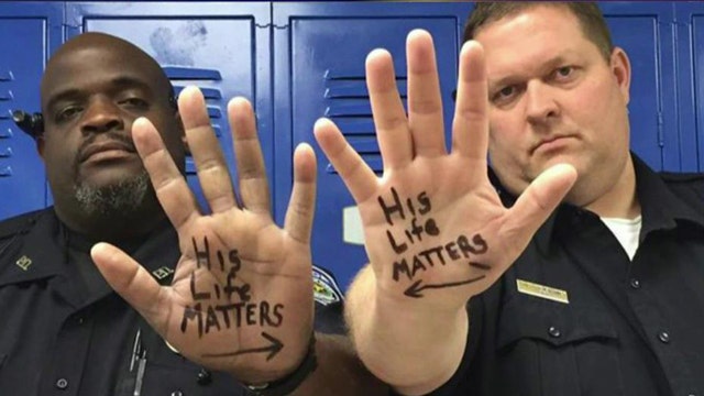 Black Cop And White Cop Make Bold Statement In Viral Photo On Air Videos Fox News