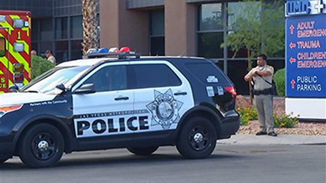 2 Las Vegas officers arrest gunman after being ambushed