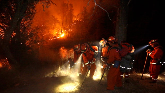 Firefighters battling massive blazes across California 