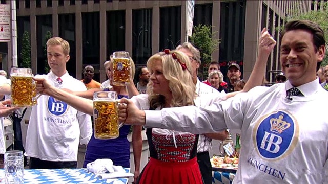 Feel the burn: 'Fox & Friends' beer stein holding contest