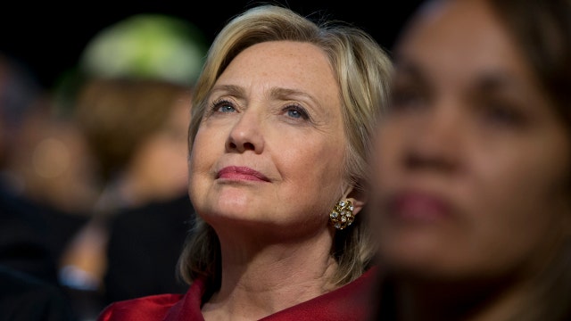 Clinton claims outsider status as Fiorina rises in polls