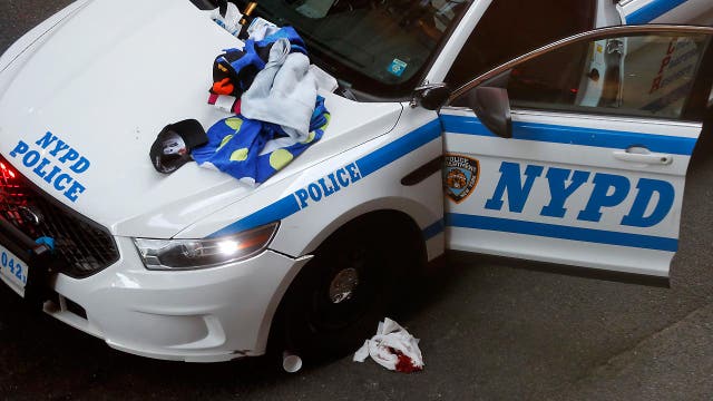 Man wielding meat cleaver injures three NYPD officers 