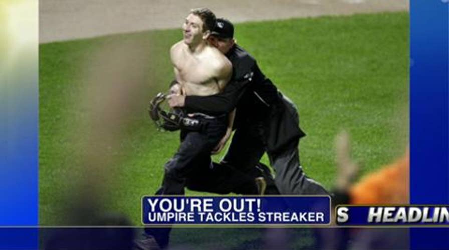 Umpire Jeff Kellogg Takes Down Streaker at Orioles Game