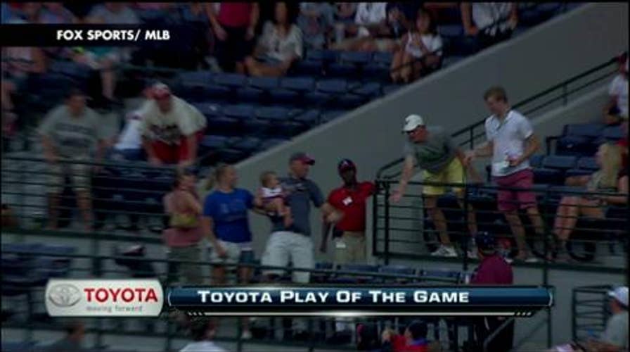 VIDEO: Braves Fan Catches Foul Ball While Holding Baby