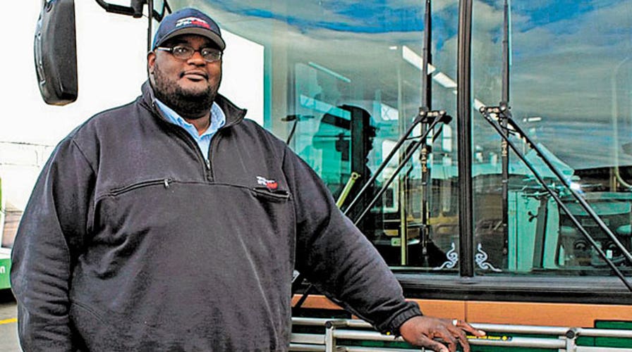 Bus driver hero talks woman off bridge