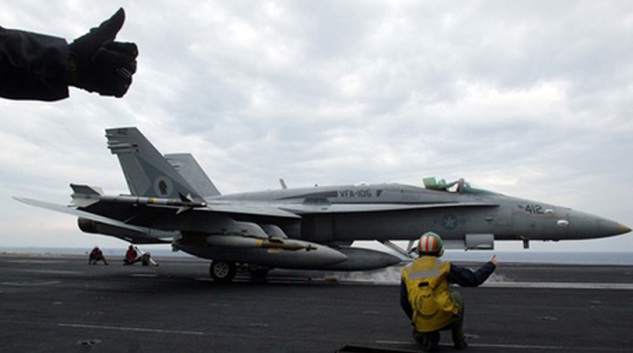 US warplanes hit Iraq militants firing on American personnel