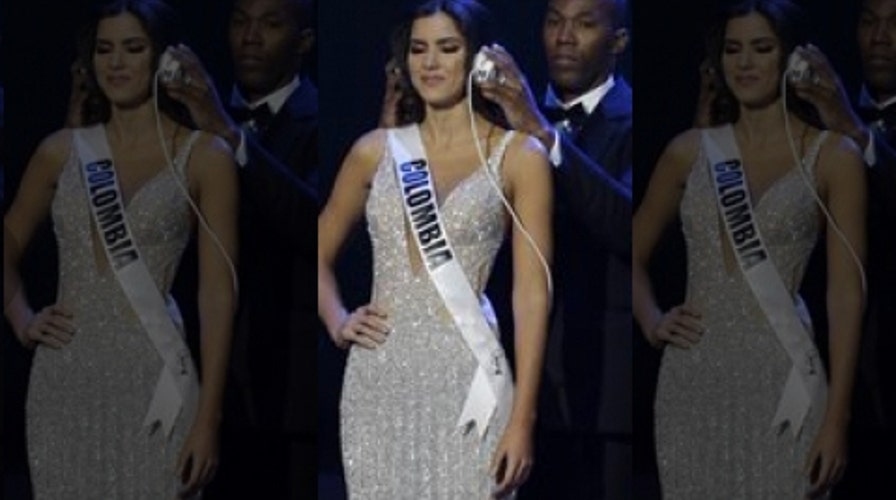 When asked again, Miss Universe sticks to her answers