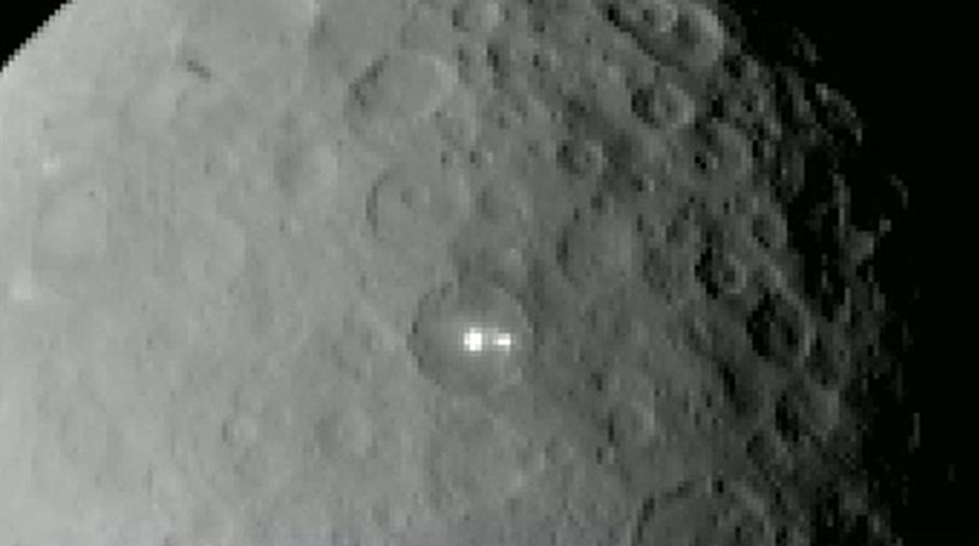 NASA probe discovers bright spots on dwarf planet