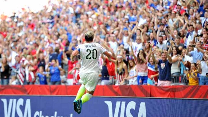 U.S. fans at World Cup celebrate Wambach's goal