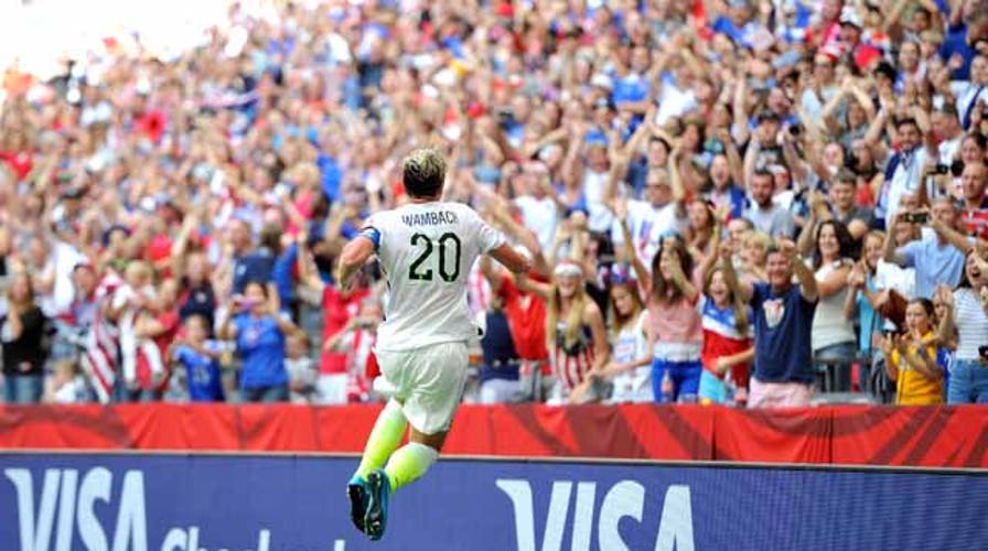 U.S. fans at World Cup celebrate Wambach's goal