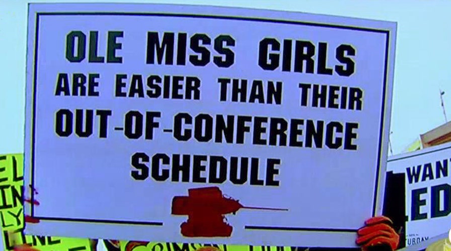 Critics blast ESPN for airing fans' 'sexist' signs