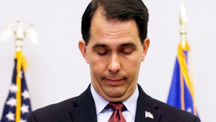 Scott Walker takes shot at Trump as he suspends his campaign