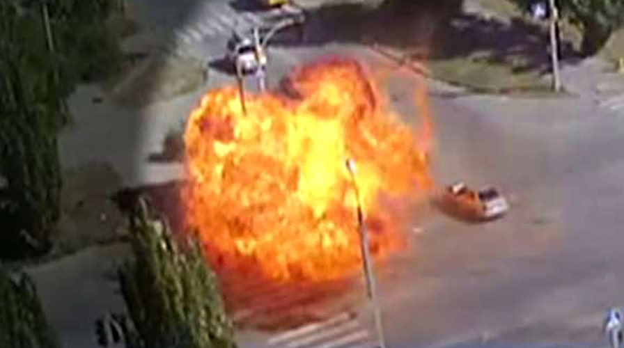 Massive fireball fills intersection after vehicles collide