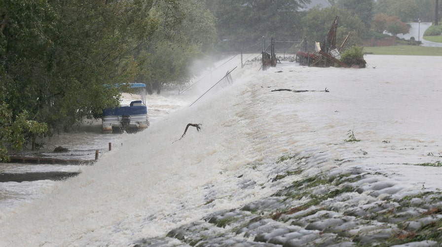 Flood waters breach dams in South Carolina