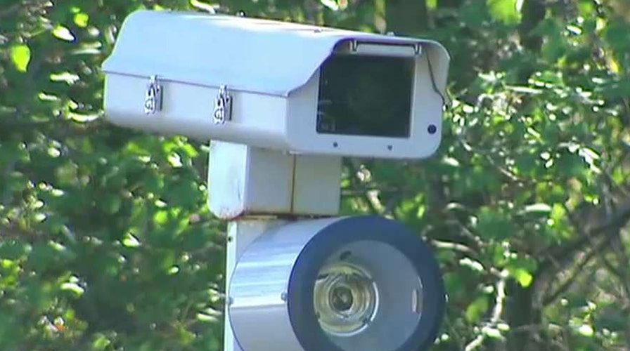 New York man charged with tampering with red light camera