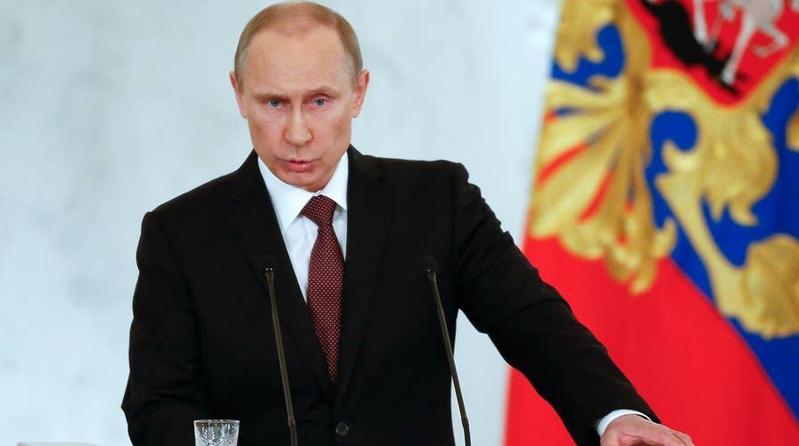 Putin lashes out at the Turks after Russian plane shot down