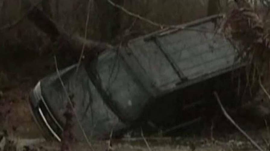 Frantic 911 call as family's SUV swept away by floodwaters