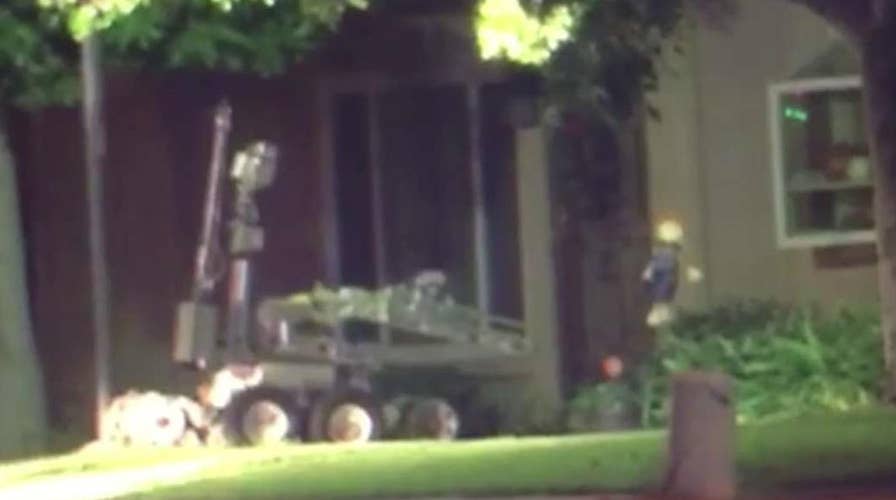 FBI using robot to search suspect's home