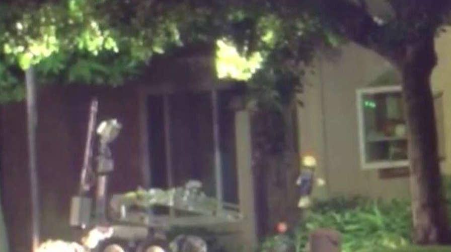 Neighbor saw 'suspicious activity' at Calif. suspects' home