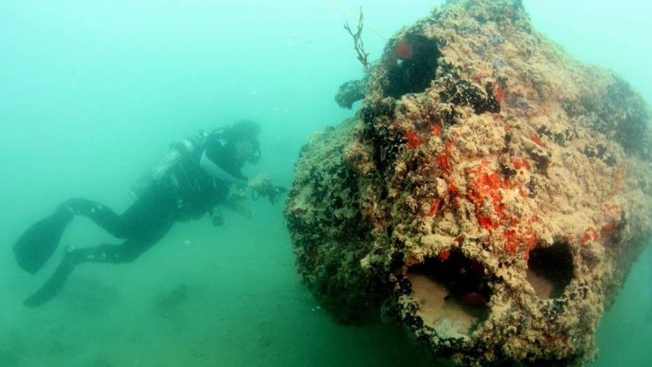 Incredible images reveal US Navy seaplane lost in Pearl Harbor attack ...