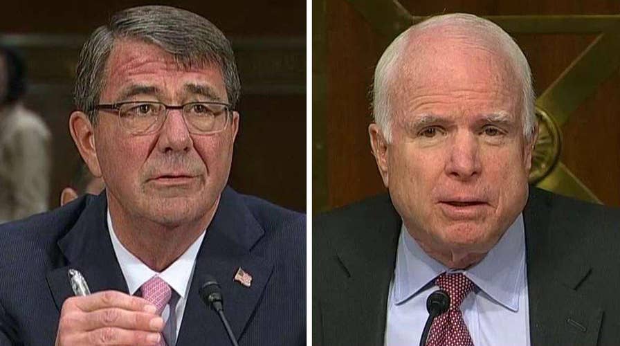 Tense exchange between McCain, Carter on containing ISIS