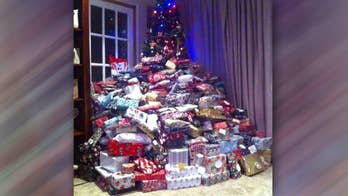 UK mom defends viral photo of Christmas tree swamped with 300 presents