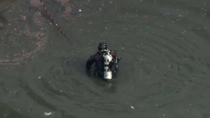 FBI divers scour lake for evidence of Calif. terror couple