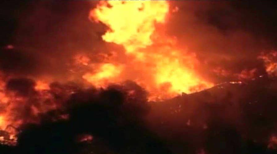 Massive warehouse fires shoots flames 100 feet into the air