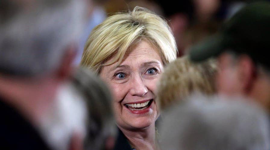 'I don't have horns': Clinton launches charm offensive