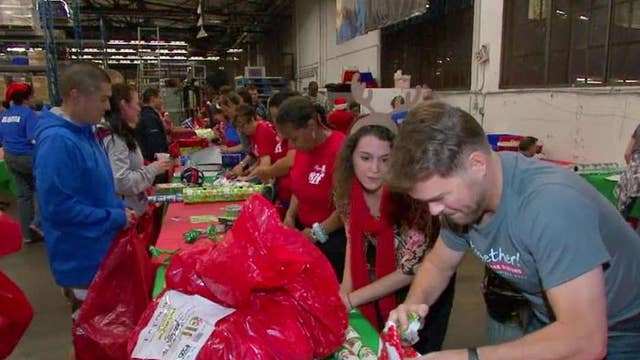 USO plays Santa for military families