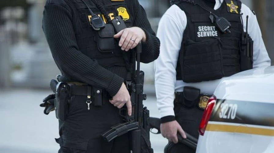 Secret Service agent's badge, gun stolen from car