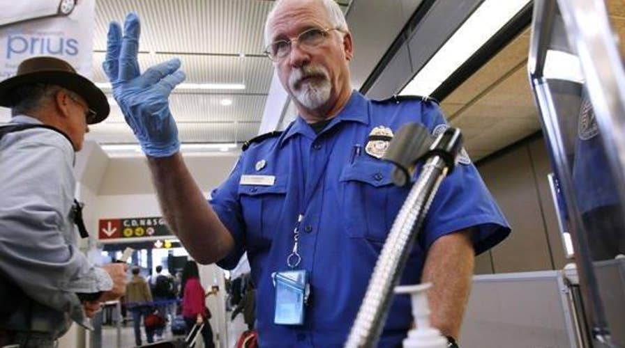 Holiday travelers face new airport security measures