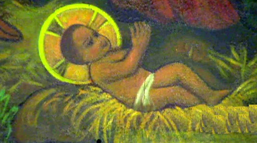 Church gets its own modern day 'baby in manger' scenario