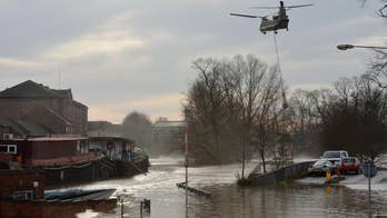 UK's Cameron: More money to be spent on flood defenses