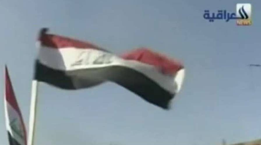 Report: Iraqi troops raise flag over Ramadi
