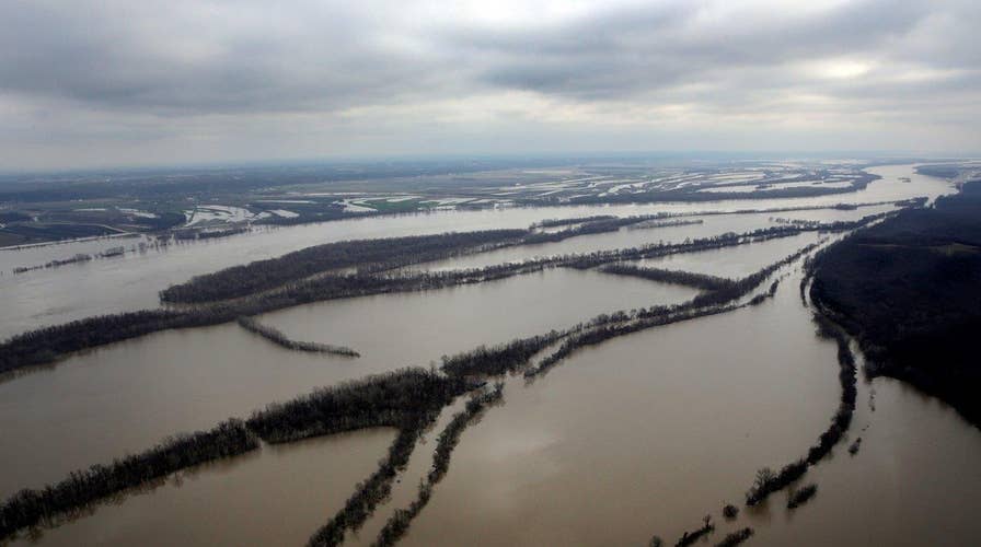 Levees failing against flood waters in Missouri, Illinois