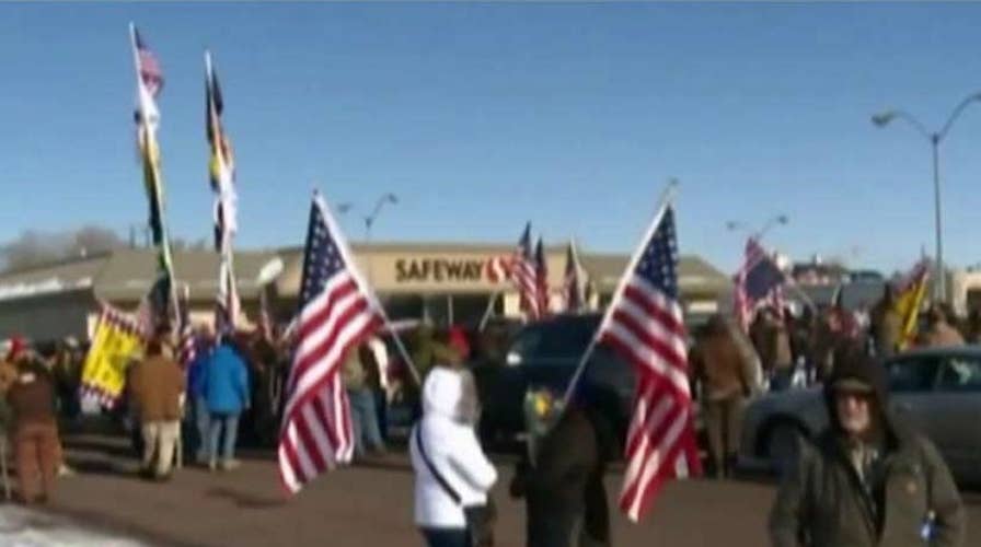 Armed militiamen refuse to leave federal site