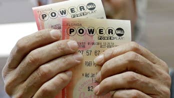 Sales grow as Powerball jackpot soars to $900 million