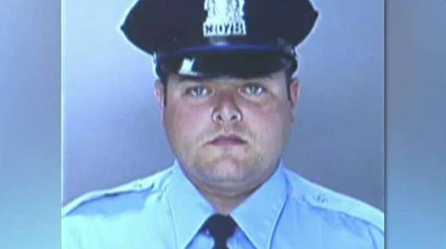 Police: Officer in 'good spirits' after nearly assassinated