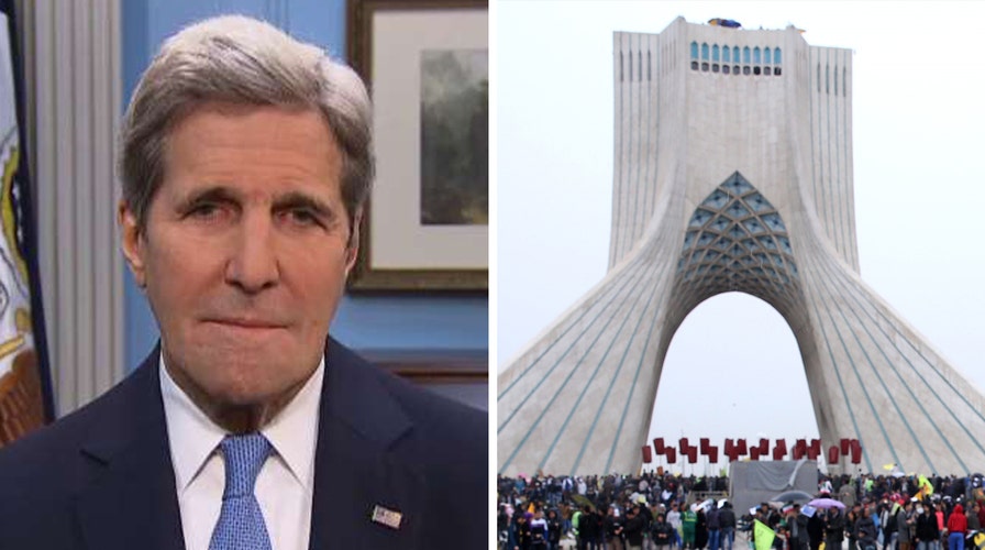 Kerry denies sanctions delayed to secure prisoner release