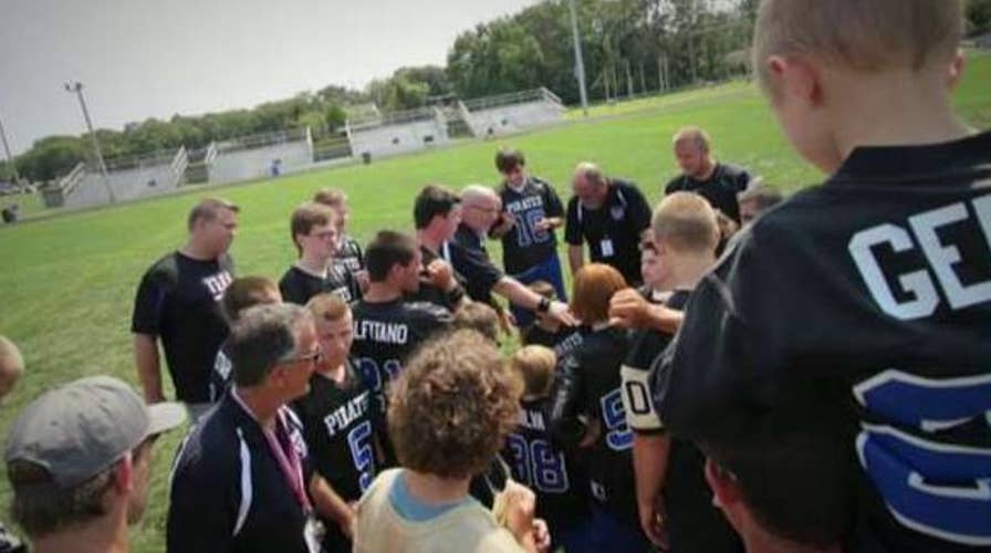 Champions coach special needs athletes in flag football