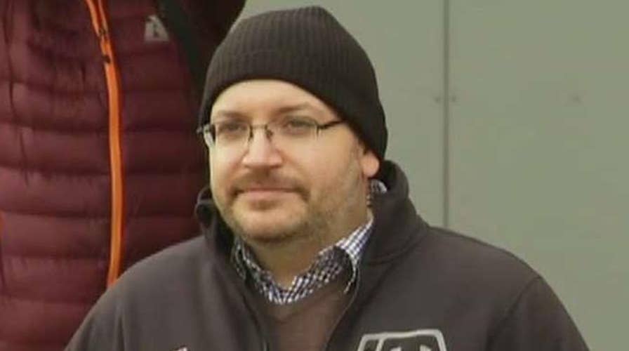 Freed American Jason Rezaian greets reporters