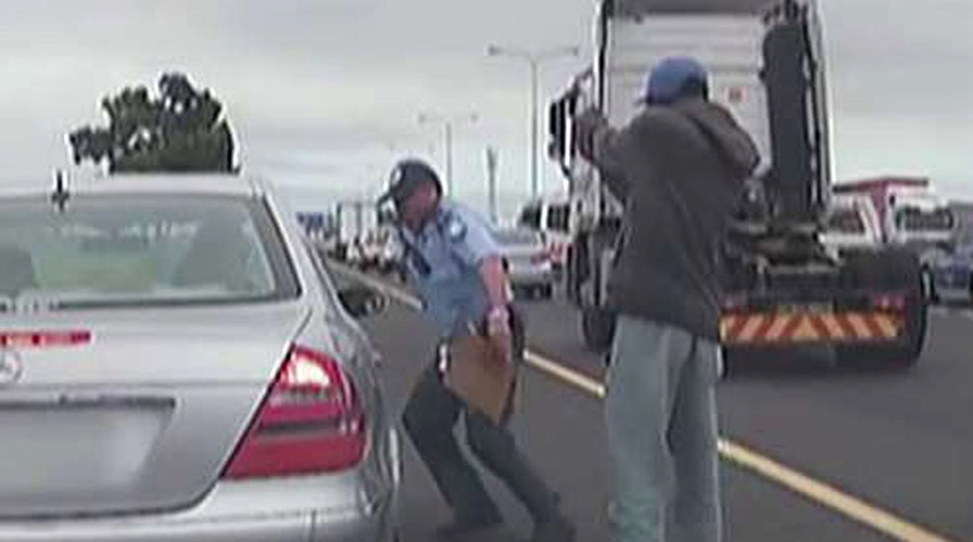 Officer shot at point-blank range during traffic stop