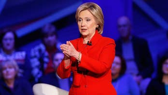An animated Clinton tries to close the enthusiasm gap with Sanders in town hall