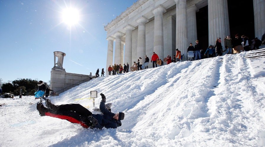 Washington DC buried under record-setting snowfall