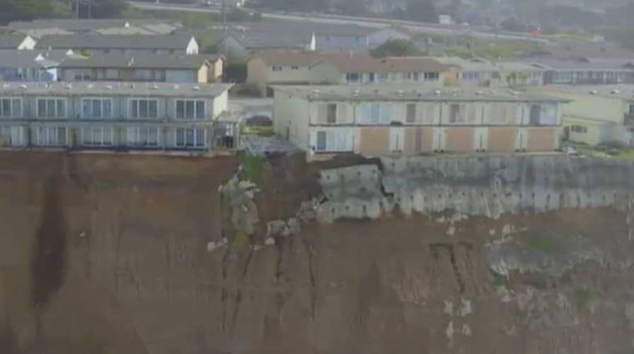 Living on the edge: Homes in danger as cliffside crumbles